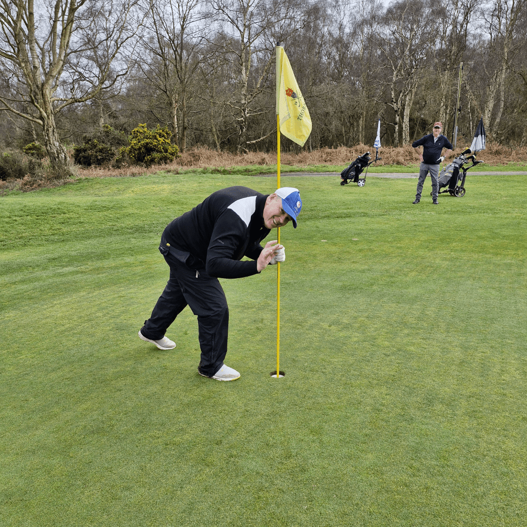 Golfer making a hole-in-one